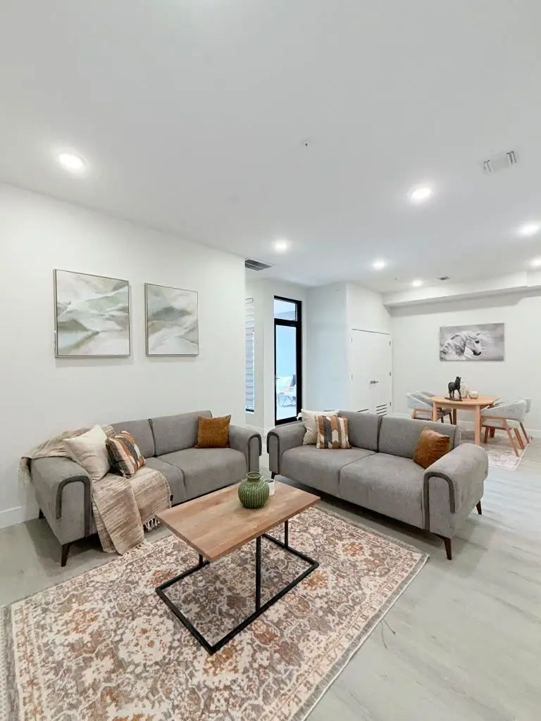 Living area with sofas and rug